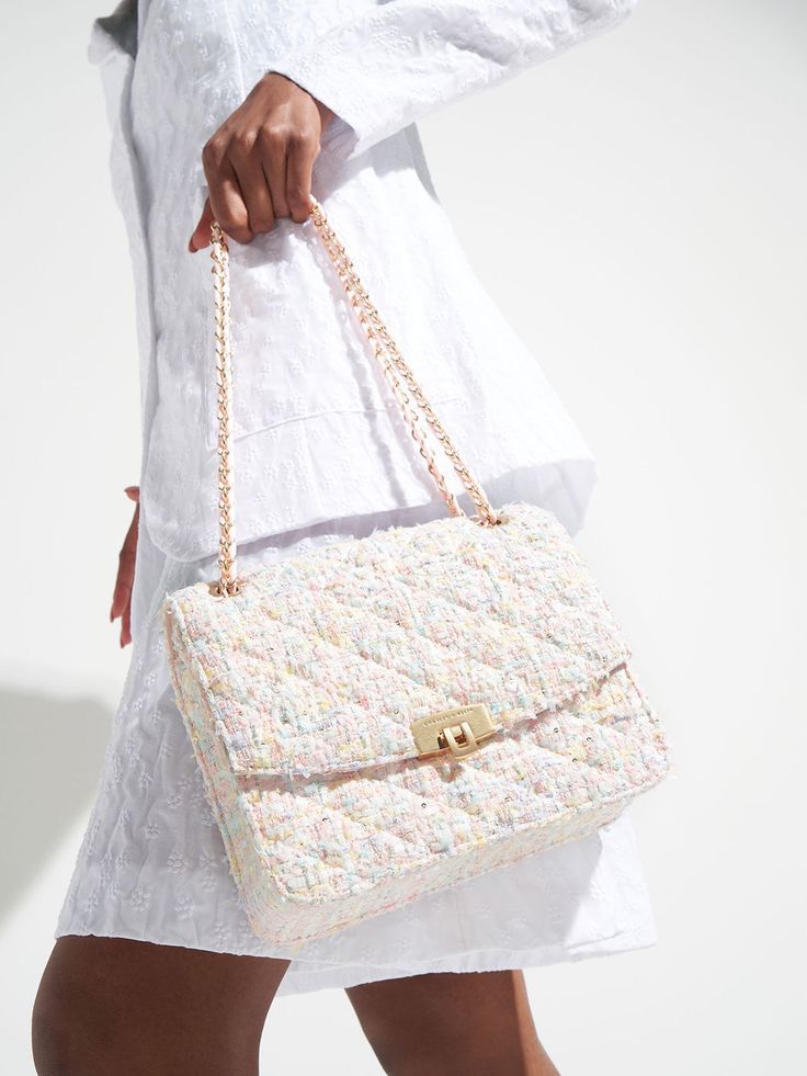 The black sequined/tweed chain-strap bag (which is a Charles & Keith bag).