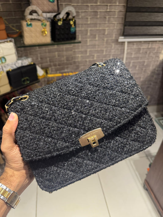 The black sequined/tweed chain-strap bag (which is a Charles & Keith bag).