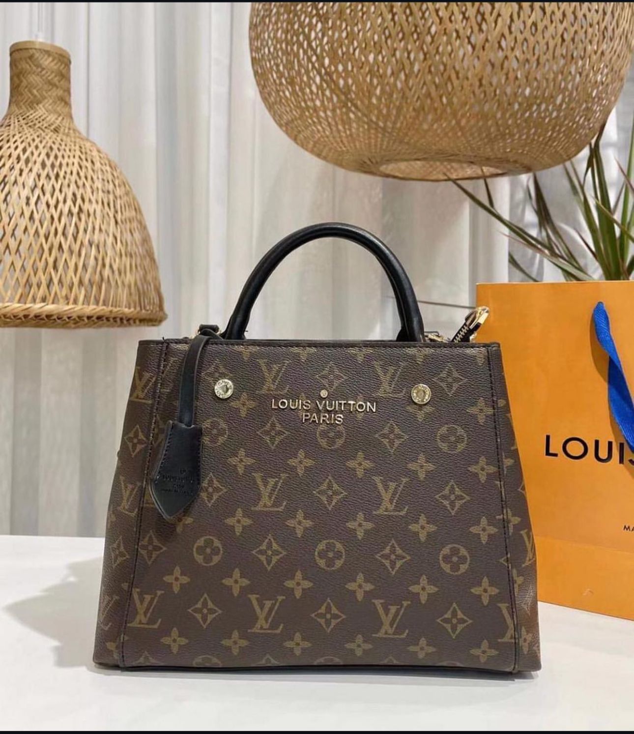 "Louis Vuitton Monogram Empreinte White Leather Tote – Timeless Elegance & Luxury"