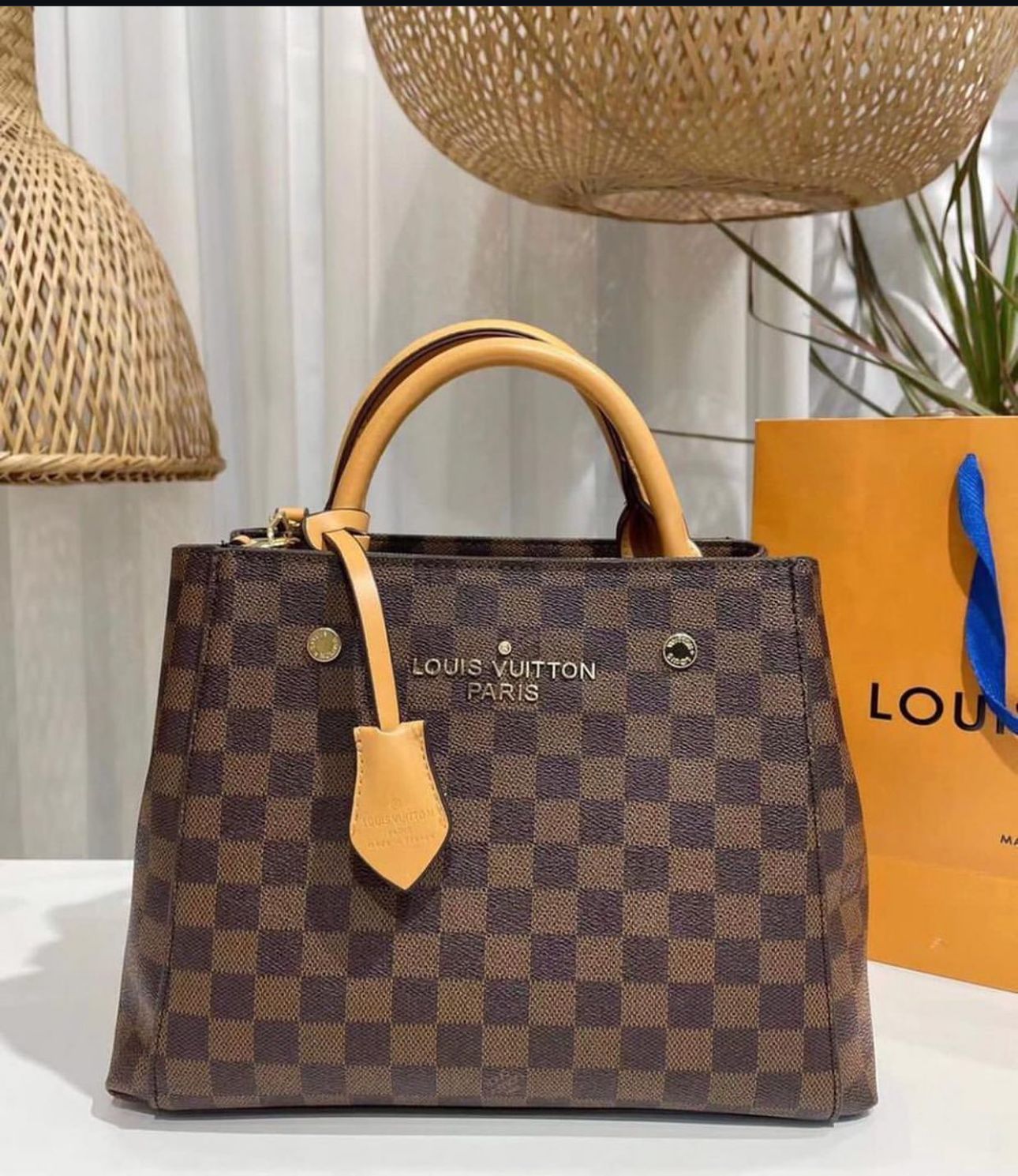 "Louis Vuitton Monogram Empreinte White Leather Tote – Timeless Elegance & Luxury"