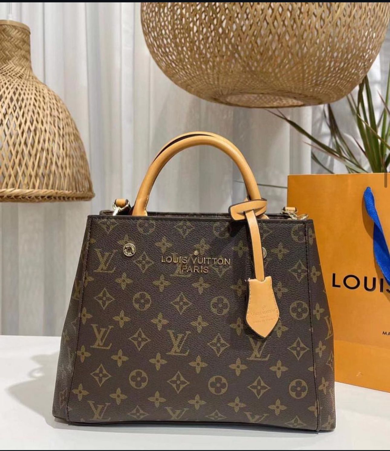 "Louis Vuitton Monogram Empreinte White Leather Tote – Timeless Elegance & Luxury"